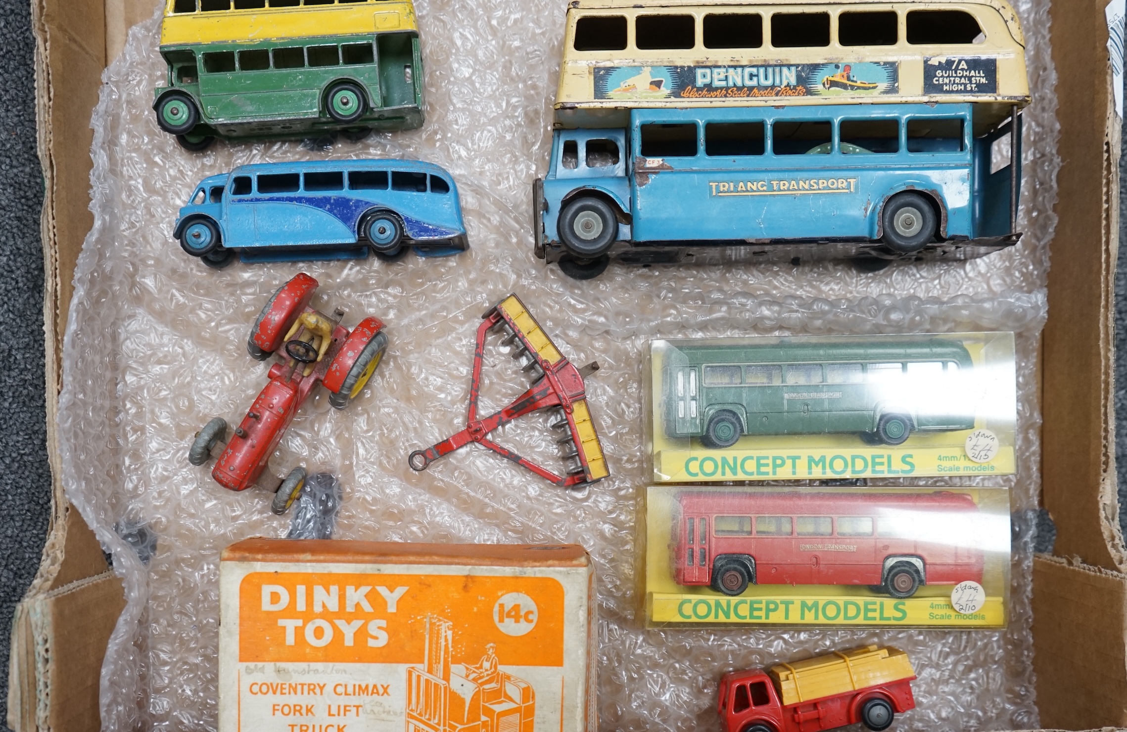 Sixteen models of buses and other vehicles by Dinky Toys, Corgi OOC, EFE, Concept Models etc. including a Tri-ang Minic clockwork tinplate double deck bus, an empty box for a Dinky Coventry Climax fork lift truck, etc. C